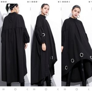 Hollowed out long sleeve Poncho dress